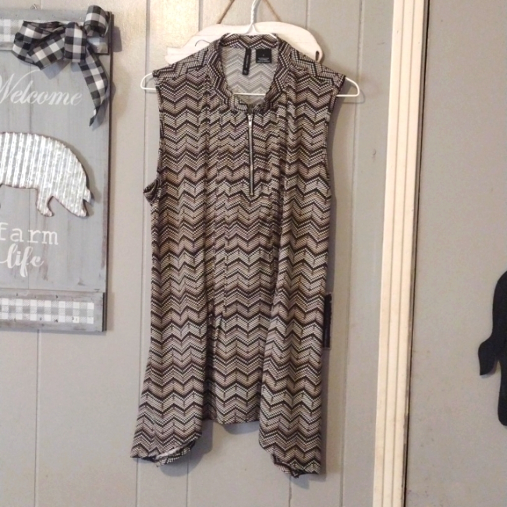 New Direction sleeveless tunic top with half zip neck.